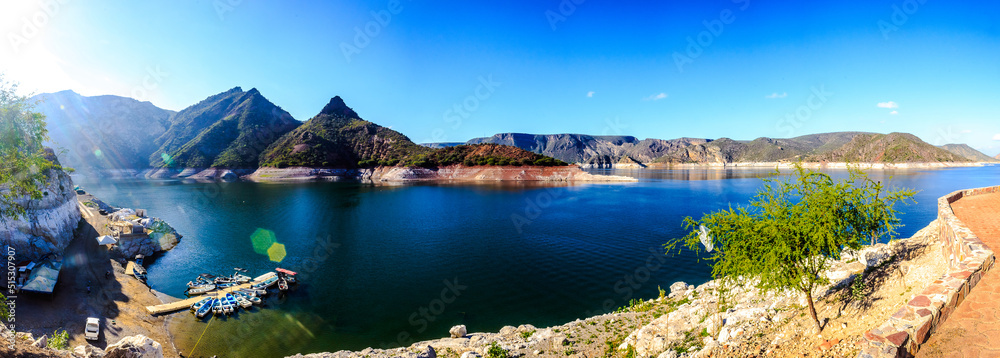 panoramic of dam at morning with mountains in the background  and touristic pier , in zimapan hidalgo 