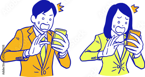 スマホを見て驚くビジネスパーソン