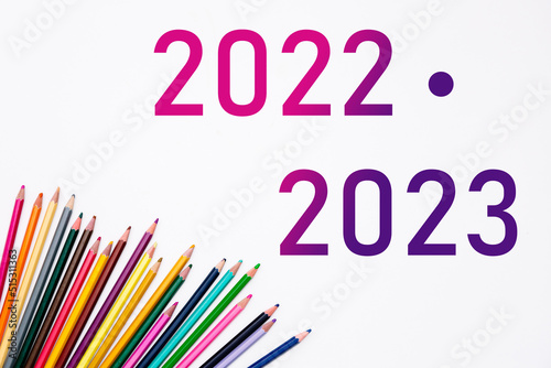 2022 2023 school year with heap colored pencils isolated on white background. Banner. Creative development and education of preschoolers, children and adults. Art stationery shop card. Year color