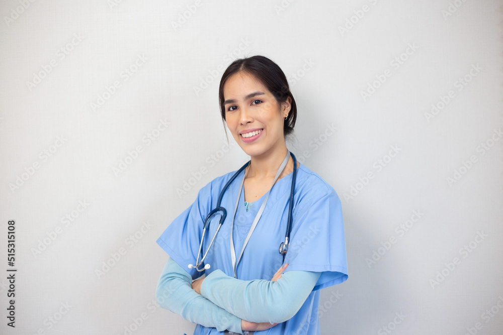 Portrait of young asian nurse in the white room, healthcare workers concept. Portrait of young asian nurse in the white room, healthcare workers concept.