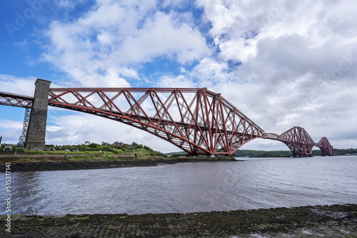 The Forth Bridge , UNESCO World Heritage Site and Scotland's greatest man-made wonder , is a cantilever railway bridge across the Firth of Forth in the east of Scotland