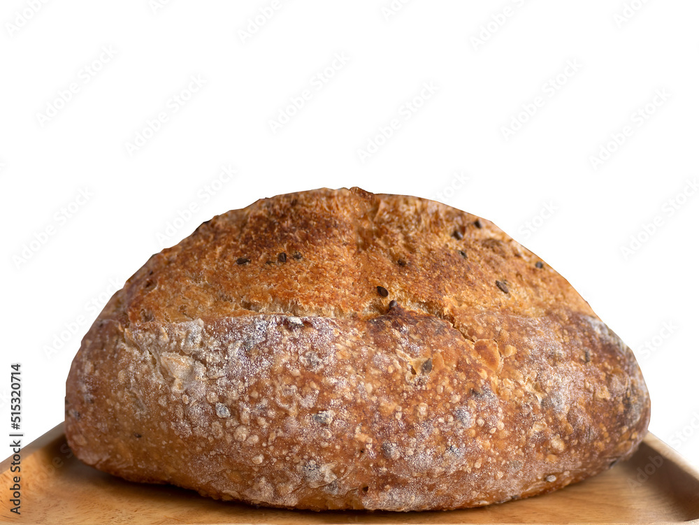 Side view of baked brown homemade sourdough on the wooden plate, isolated, plain background with copy space and clipping path Side view of baked brown homemade sourdough on the wooden plate, isolated, plain background with copy space and clipping path