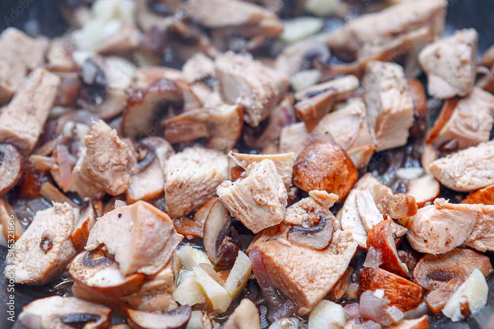Fotografie Baked meat with mushrooms