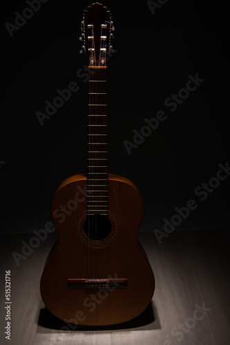 Classical guitar low key on a dark background