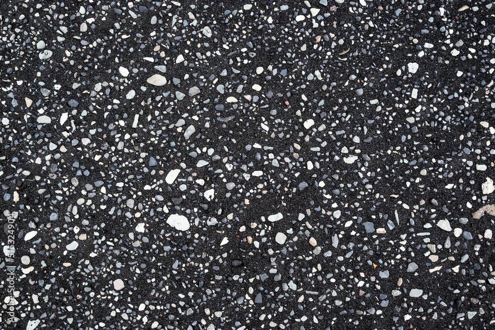Natural background texture of pebbles, small stones and black sand, Diamond Beach, Iceland Natural background texture of pebbles, small stones and black sand, Diamond Beach, Iceland
