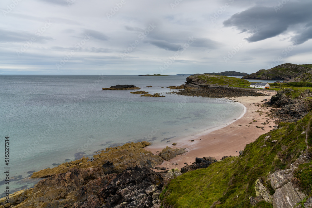 Scottish Highlands coastline and the beauitful golden pink sand beach of Clashnessie in Sutherland Scottish Highlands coastline and the beauitful golden pink sand beach of Clashnessie in Sutherland