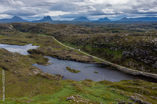 coastal road on the North Coast 500 scenic drive in the Scottish Higlands near Lochniver photo