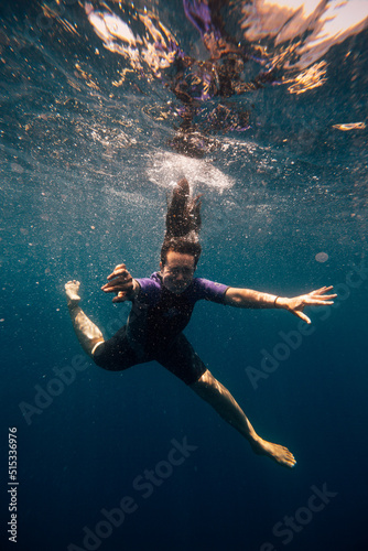 Wallpaper Mural Woman diving in lake Torontodigital.ca