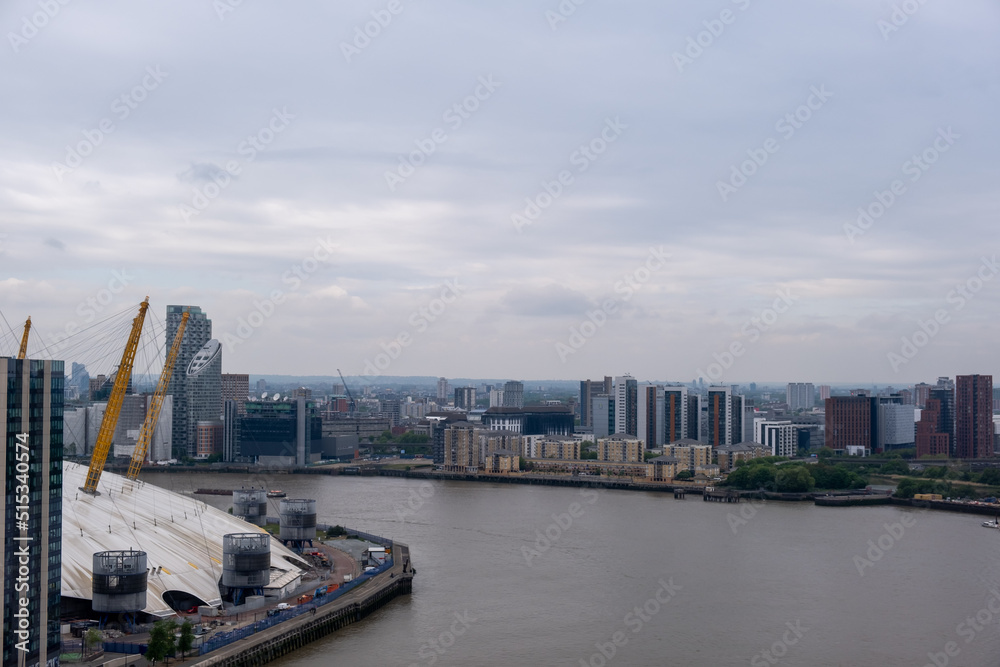 Aerial or bird view of Thames river and London's skyline