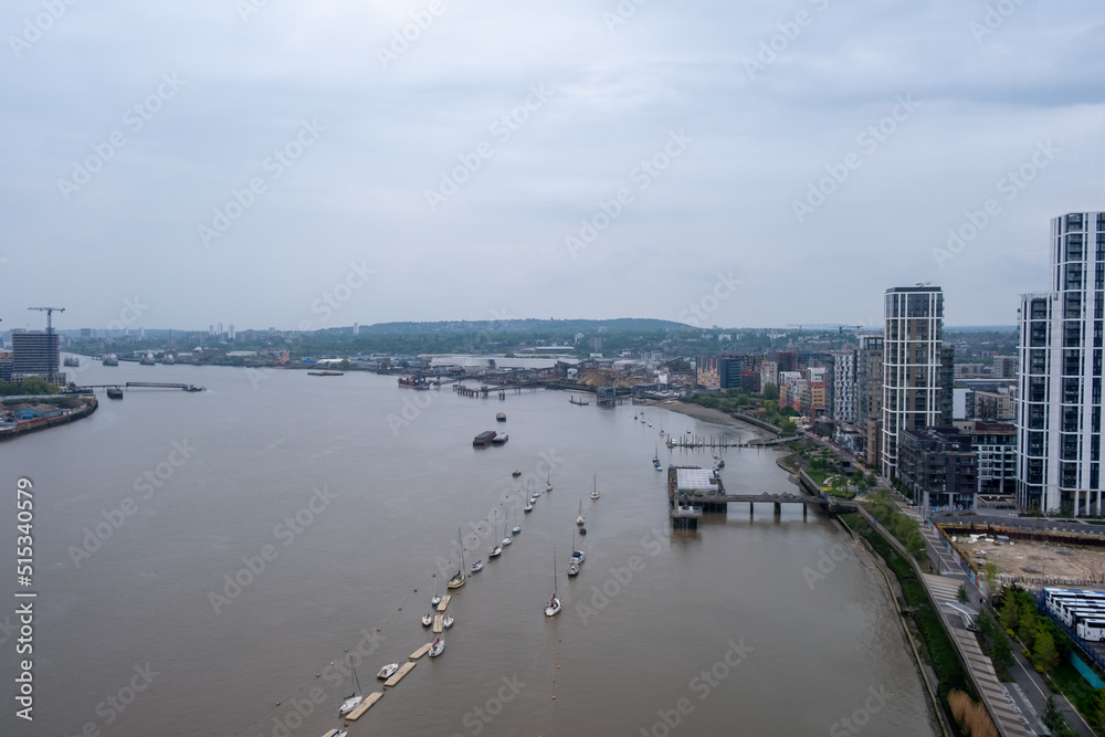 Aerial or bird view of Thames river and London's skyline