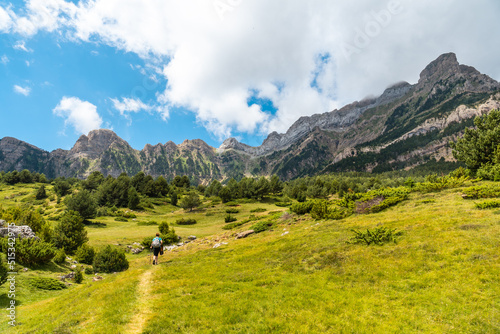 A young woman on the trek going up the mountain to the Piedrafita arch, Alto Gallego, Huesca, Aragon