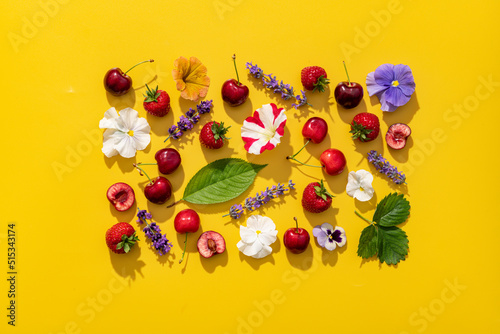 Cherry fruits pattern in a vibrant summer mood on bright yellow