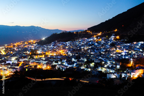 Cityscape of the blue city Chefchaouen by night © Oualid