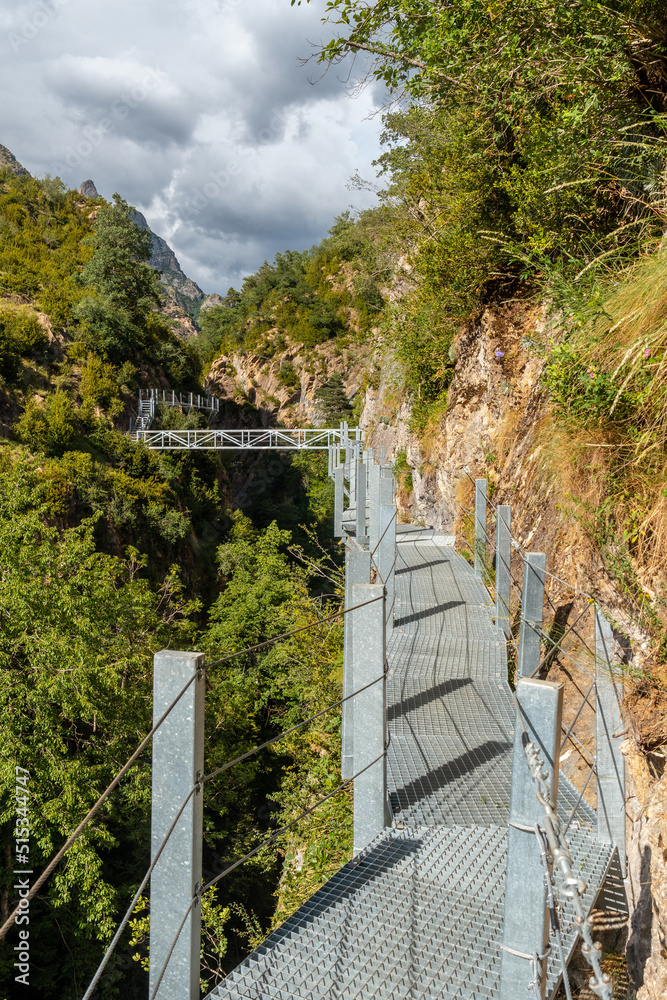 Path of the metal footbridge in the mountain in the town of Panticosa in the Pyrenees, Huesca. Spain