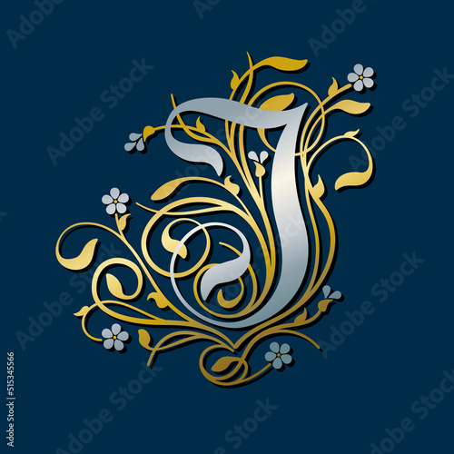 Ornamental Silver Initial Letter J With Golden Tendrils, Leaves And Forget-me-not Flowers On A Dark Blue Background