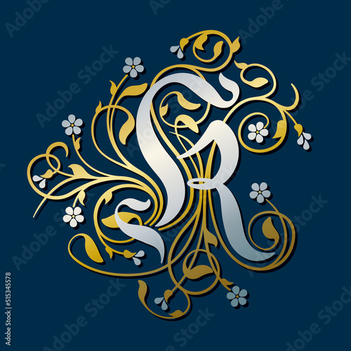 Ornamental Silver Initial Letter K With Golden Tendrils, Leaves And Forget-me-not Flowers On A Dark Blue Background