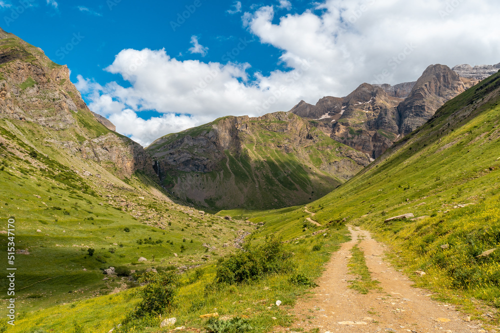 Mountain path in the Ripera valley in summer, Pyrenees Mountains in summer Mountain path in the Ripera valley in summer, Pyrenees Mountains in summer