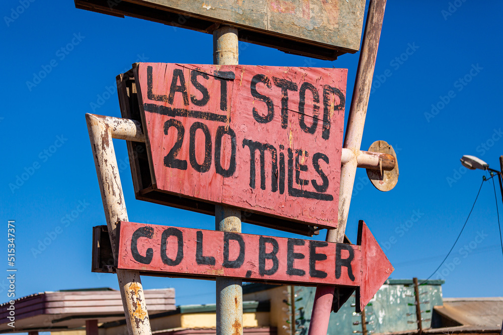 Obraz premium Ouarzazate, Morocco - 18 December 2021 : Ancient traffic sign of a gas station