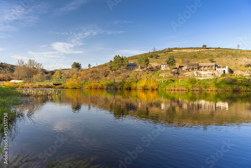 View at river level towards the community village of Rio de Onor. Portugal. photo