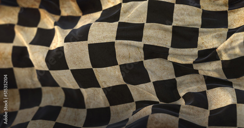 Old Checkered Flag waving at wind