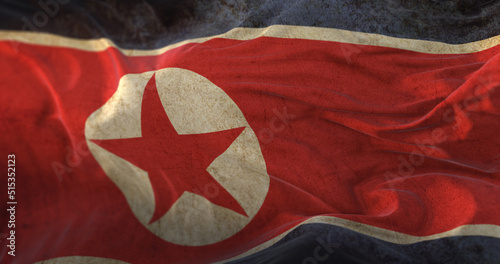 Old North Korea Flag waving at wind photo