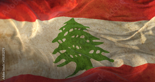 Old flag of Lebanon waving photo