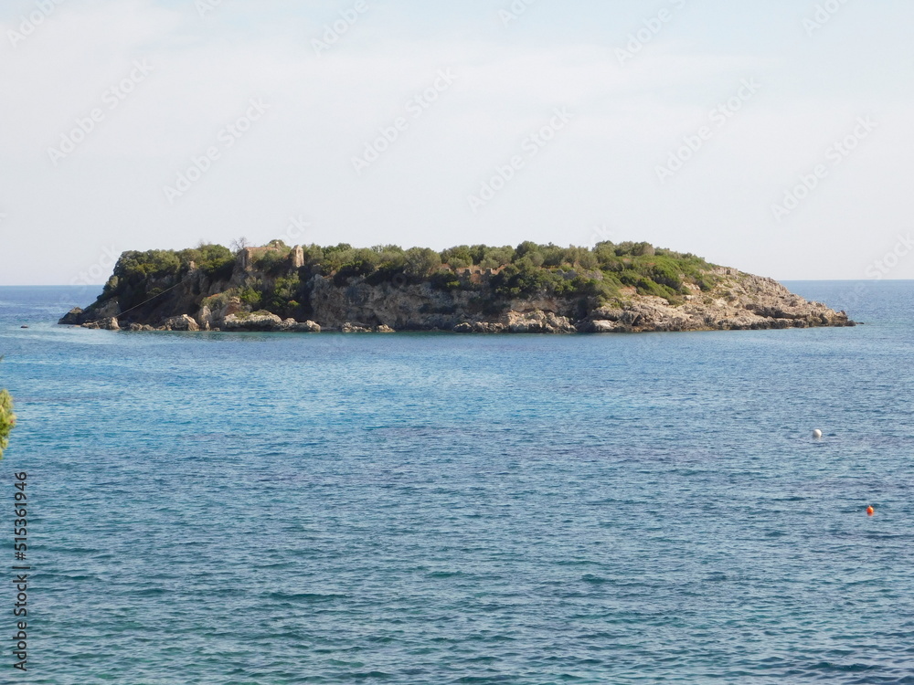 A small island near the coast of the town of Kardamyli, at Mani, Greece A small island near the coast of the town of Kardamyli, at Mani, Greece