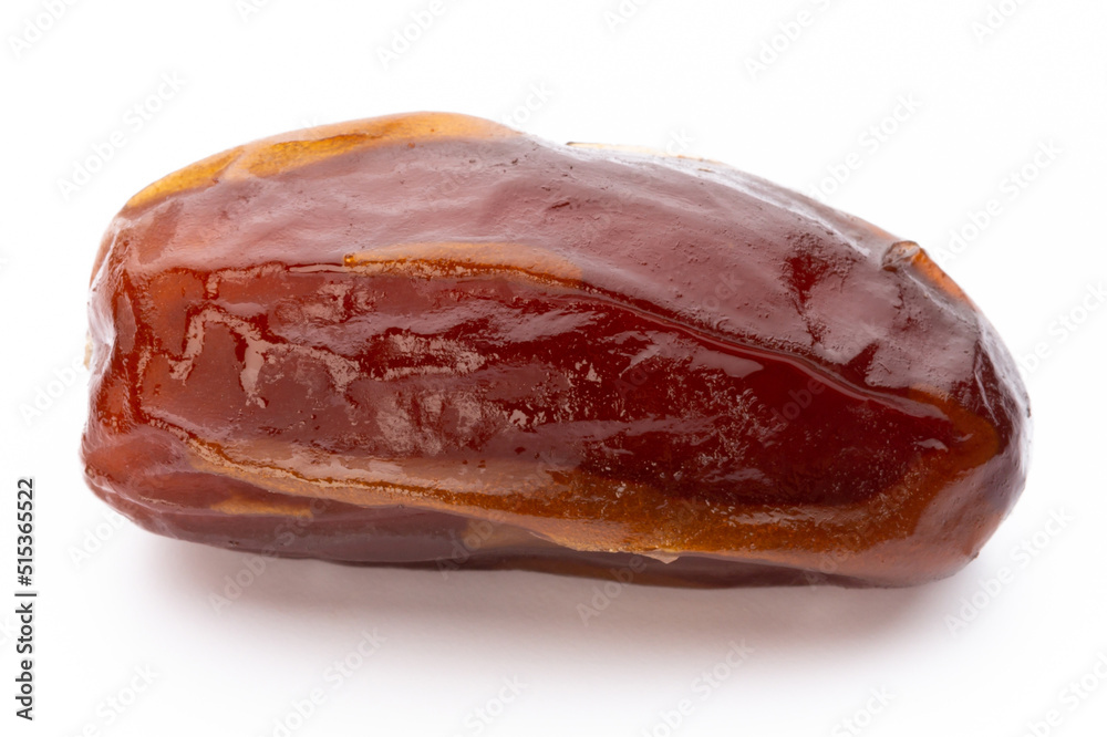 Dry dates isolated on white background. Top view. Flat lay pattern. Dry dates isolated on white background. Top view. Flat lay pattern.