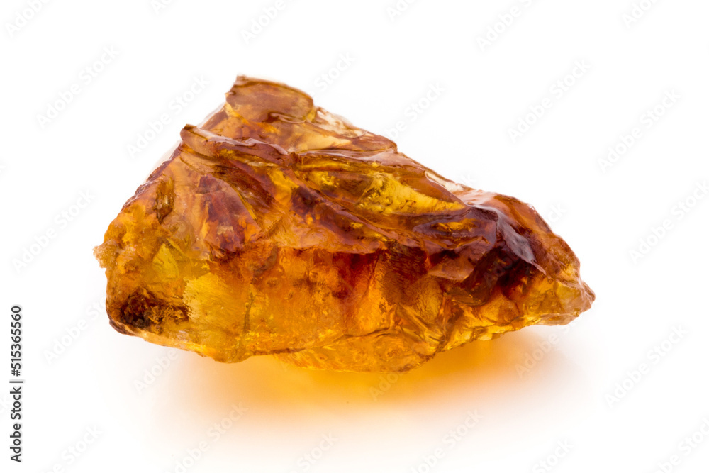 Brown caramelized sugar on white background. Brown caramelized sugar on white background.