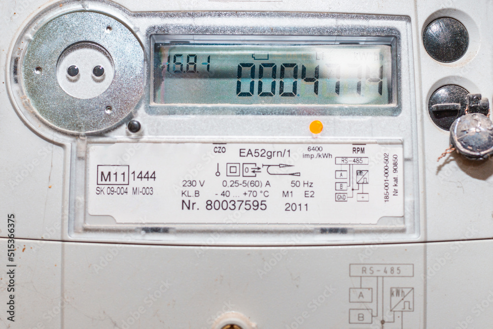 Fototapeta premium smart electric power meter counter measuring power usage.Close-up of modern smart grid residential digital power supply meter.Indoors shot.Selective focus.