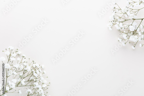 Beautiful flower background of pink gypsophila flowers. Flat lay, top view. Floral pattern. photo