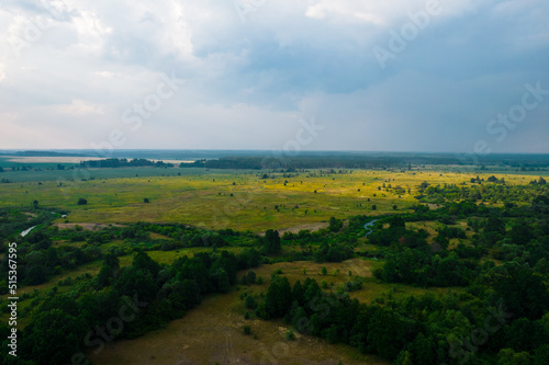 sunset in the clouds with the rays of the sun, view from the drone