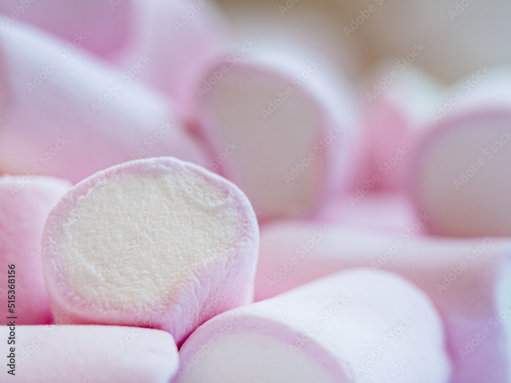 close up photo of a white and pink marshmallow in natural light close up photo of a white and pink marshmallow in natural light