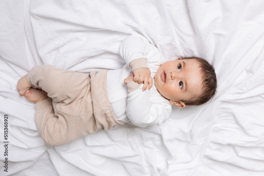 adorable little boy laying on blanket, card, banner, health adorable little boy laying on blanket, card, banner, health