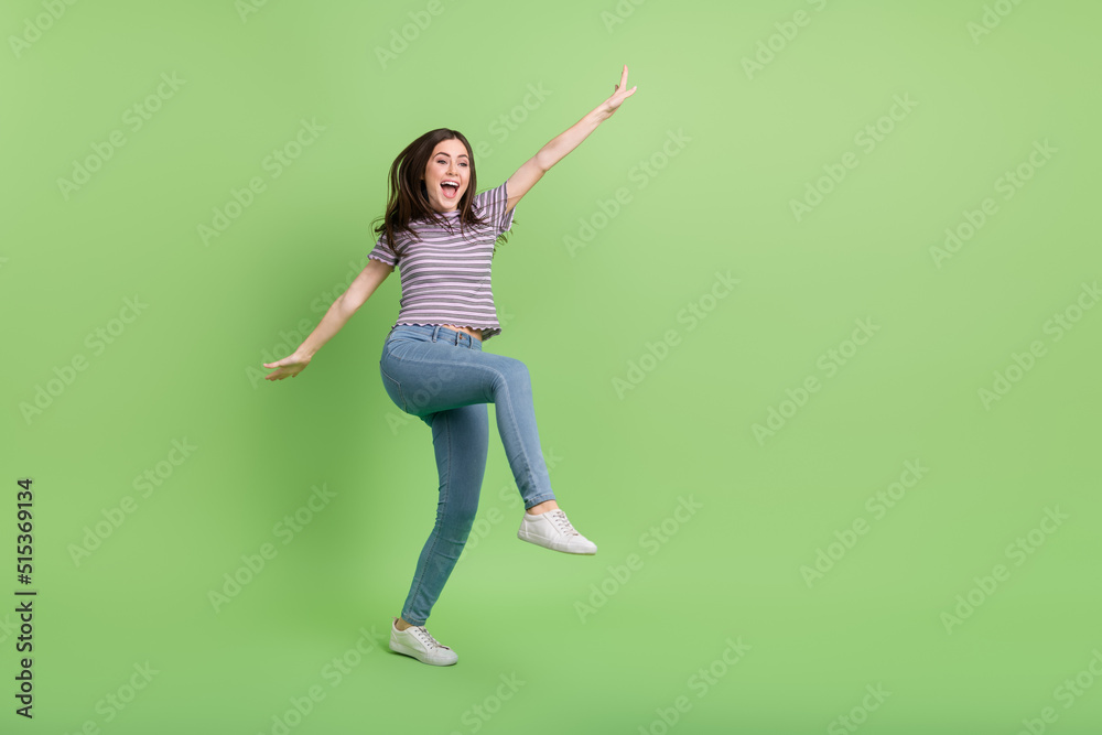Full size photo of satisfied cheerful lady enjoy clubbing entertainment isolated on green color background