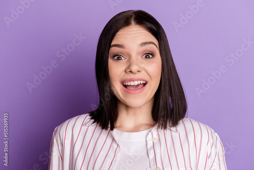 Photo of young excited pretty woman amazed omg wow information discount isolated over violet color background