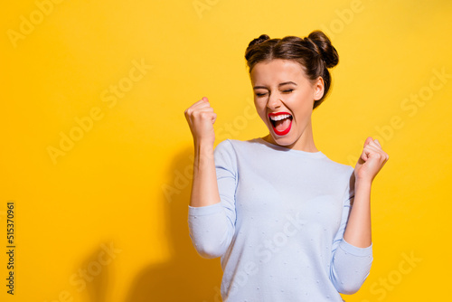 Photo of ecstatic lady shout loud yeah fist up raise win lottery isolated bright shine color background photo