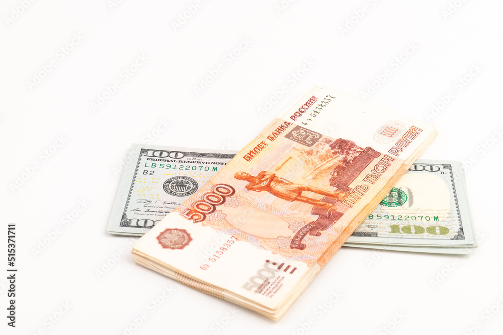 US Dollar and Russian ruble. Money background. Currency exhange. Economic crisis. Rouble dollar cash. Hundred dollar bill and 5000 rubles. Business and finance. Russia and USA US Dollar and Russian ruble. Money background. Currency exhange. Economic crisis. Rouble dollar cash. Hundred dollar bill and 5000 rubles. Business and finance. Russia and USA