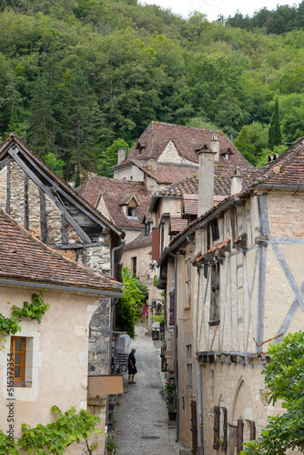 Tale french village in midi-pyrenee  in a forest. Saint cirq la poppie. photo