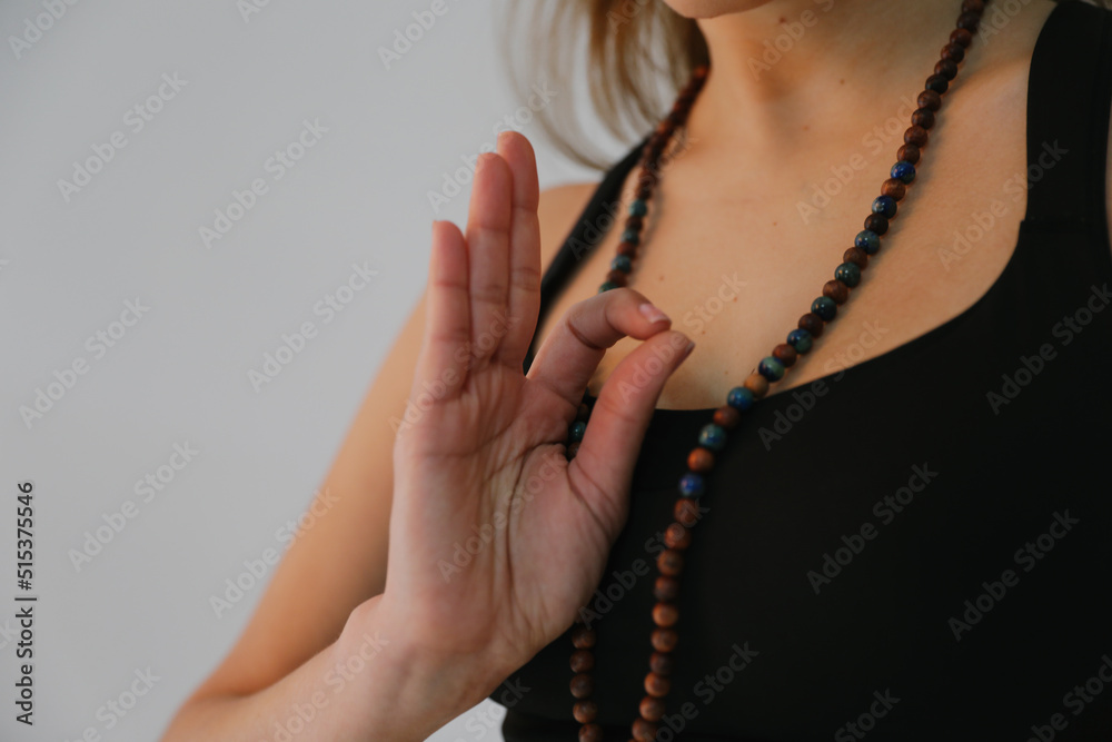 Close-up of yoga woman practicing meditation at home, breathing. Mock-up.