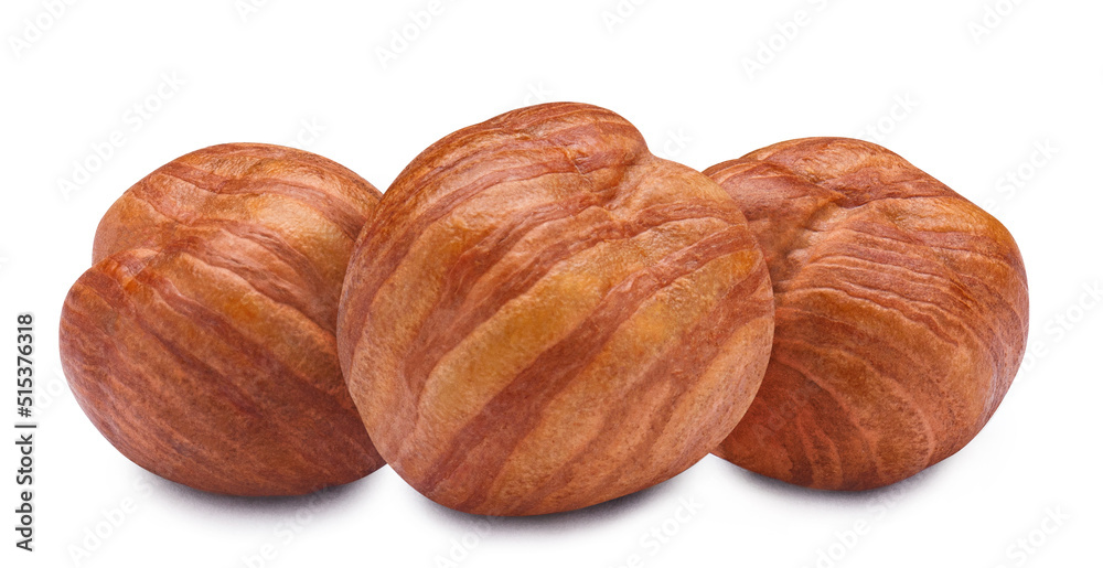 Three delicious hazelnuts, isolated on white background Three delicious hazelnuts, isolated on white background