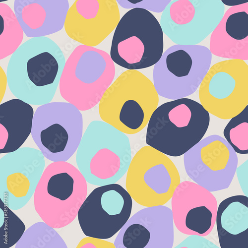 Bold geometric seamless pattern. Colorful dots, blobs, blots, circles cut out background.