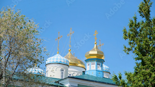 Принти на полотні Orthodox crosses on gold domes cupolas againts blue clear sky