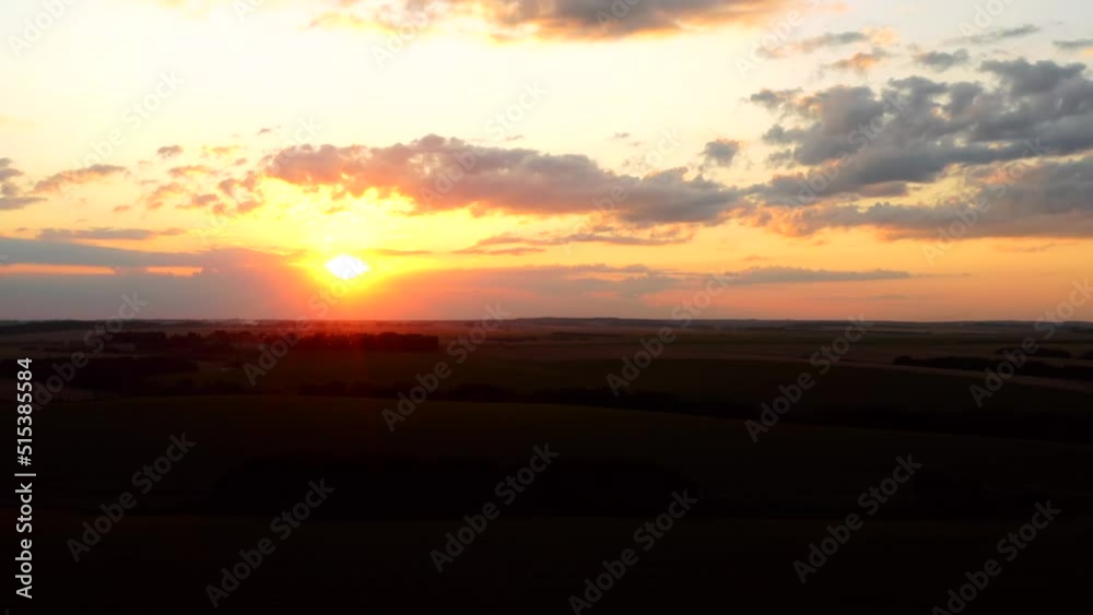 Breathtaking sunset over farmland in summer. Breathtaking sunset over farmland in summer.