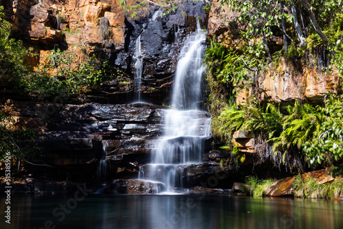 Idyllic Billabong with waterfall and reflections at Galvans Gorge in the Kimberley  Western Australia