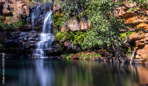 Idyllic Billabong with waterfall and reflections at Galvans Gorge in the Kimberley, Western Australia