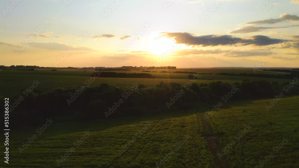 Breathtaking sunset over farmland in summer. Breathtaking sunset over farmland in summer.