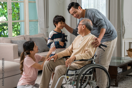 Young asian couple and child visiting grandparents in nursing home