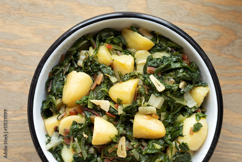 Blitva traditional homestyle south Croatia dish made with boiled potatoes, swiss chard, garlic and olive oil. photo