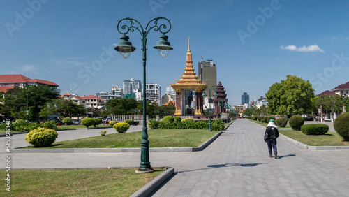 Park along Preah Sihanouk Boulevard with Statue of King Father Norodom Sihanouk in Phnom Penh, Cambodia. photo